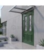 Groene draaideur in traditionele stijl met glas
